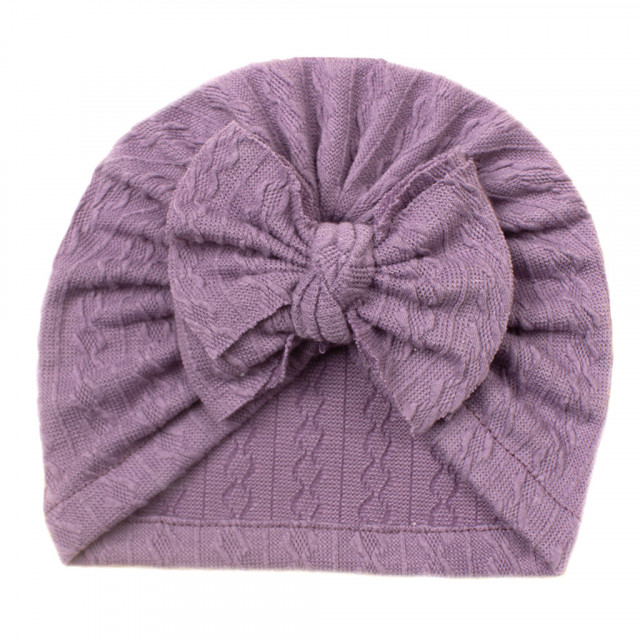 Caciulita tip turban cu model din tesatura si funda aplicata (marime