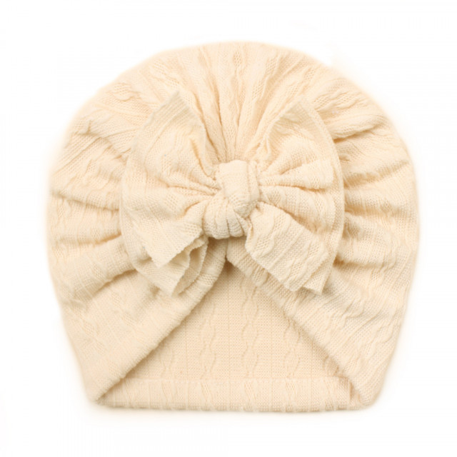 Caciulita tip turban cu model din tesatura si funda aplicata (marime