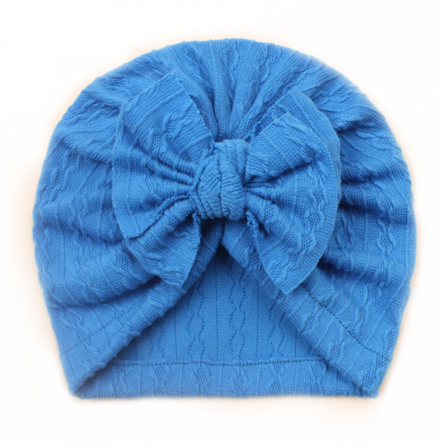 Caciulita tip turban cu model din tesatura si funda aplicata (marime