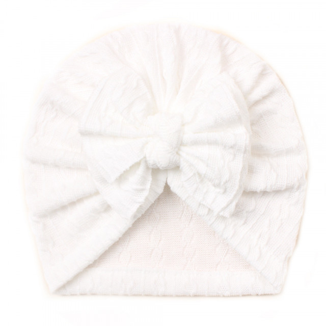 Caciulita tip turban cu model din tesatura si funda aplicata (marime