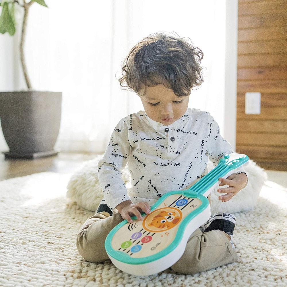 Jucarie muzicala ukulele fermecat baby einstein
