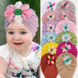 Caciulita tip turban cu floricica multicolora (marime disponibila: 6-9 luni