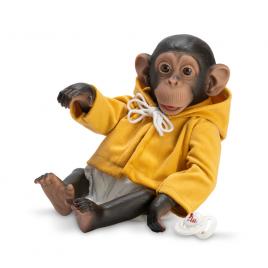 Figurina maimutica reborn cu scutec, hainuta cu gluga galbena si suzeta