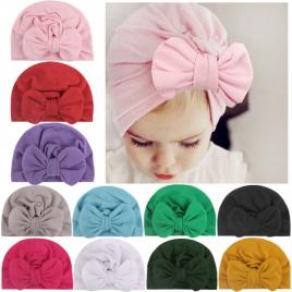 Caciulita tip turban cu fundita (marime disponibila: 6-9 luni (marimea 19