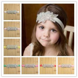 Bentita pentru fetite cu strasuri (marime disponibila: 0-12 luni, culoare: lila)