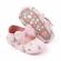 Pantofiori roz cu floricele si fundita (marime disponibila: 0-3 luni)