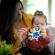 Jucarie senzoriala curiosity clutch twist & pop rattle teether baby einstein