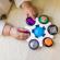Jucarie senzoriala curiosity clutch twist & pop rattle teether baby einstein