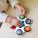 Jucarie senzoriala curiosity clutch twist & pop rattle teether baby einstein