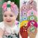 Caciulita tip turban cu floricica multicolora (marime disponibila: 6-9 luni