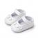 Pantofiori albi cu trei floricele aplicate (marime disponibila: 6-9 luni