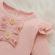 Compleu cu body roz si pantaloni verzi inflorati (marime disponibila: 9-12 luni