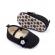 Pantofiori negri cu floricica alba decorativa (marime disponibila: 9-12 luni
