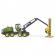 Tractor forestier john deere 1270g cu un bustean bruder