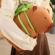 Jucarie de plus kapibara, maro, cu rucsac verde, 35 cm