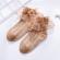 Sosetele cu model din tesatura si volanas din tulle (marime disponibila: 9-12
