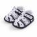 Sandalute albe cu stelute negre (marime disponibila: 3-6 luni (marimea 18